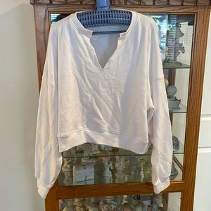 Missguided. Cropped v neck white sweatshirt. Size 8.